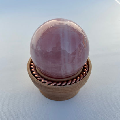 Rose Quartz Sphere with Tensor Ring Maple Wood Stand